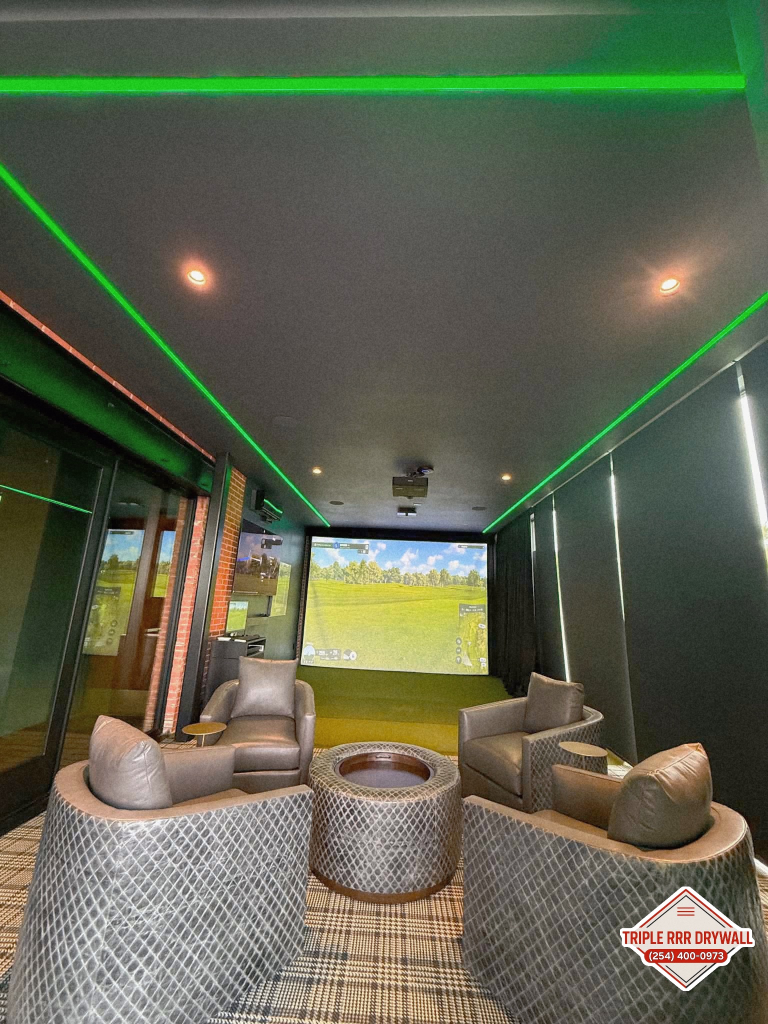 Waco golf simulator room drywall project with finished dark walls and smooth ceiling lines