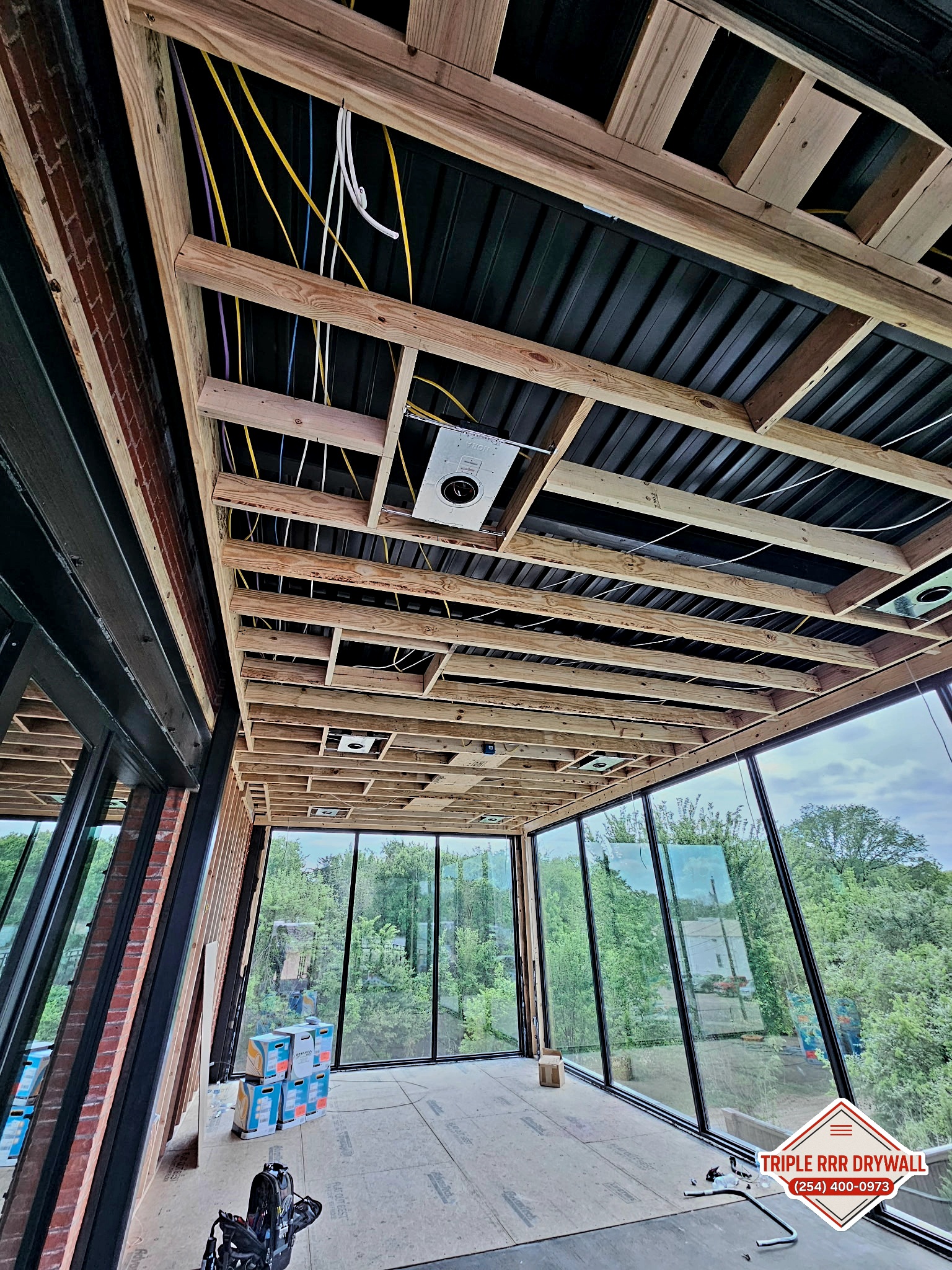 Triple RRR Drywall custom golf simulator room finish work in Waco Texas