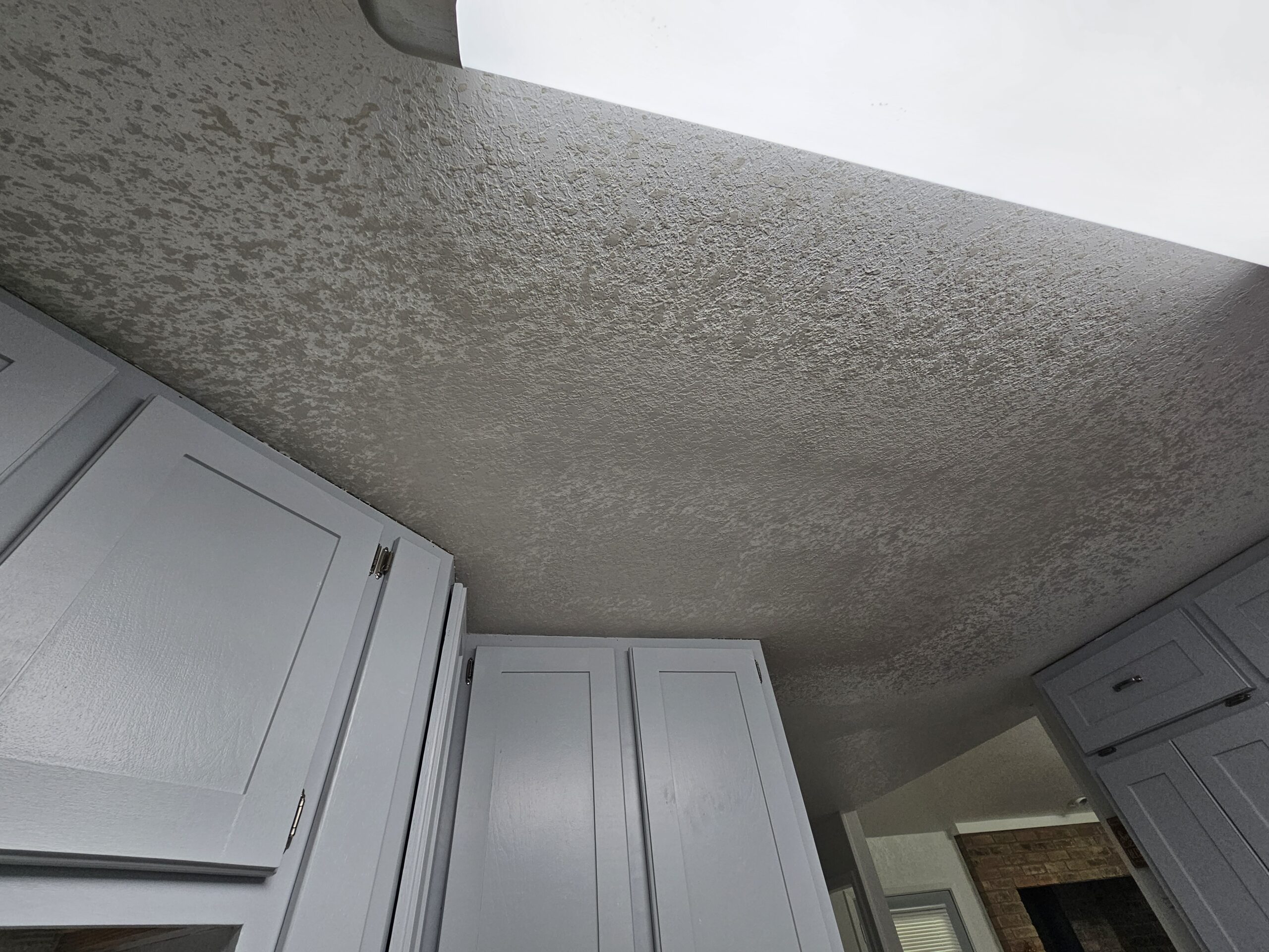 After photo of repaired ceiling drywall with finished texture