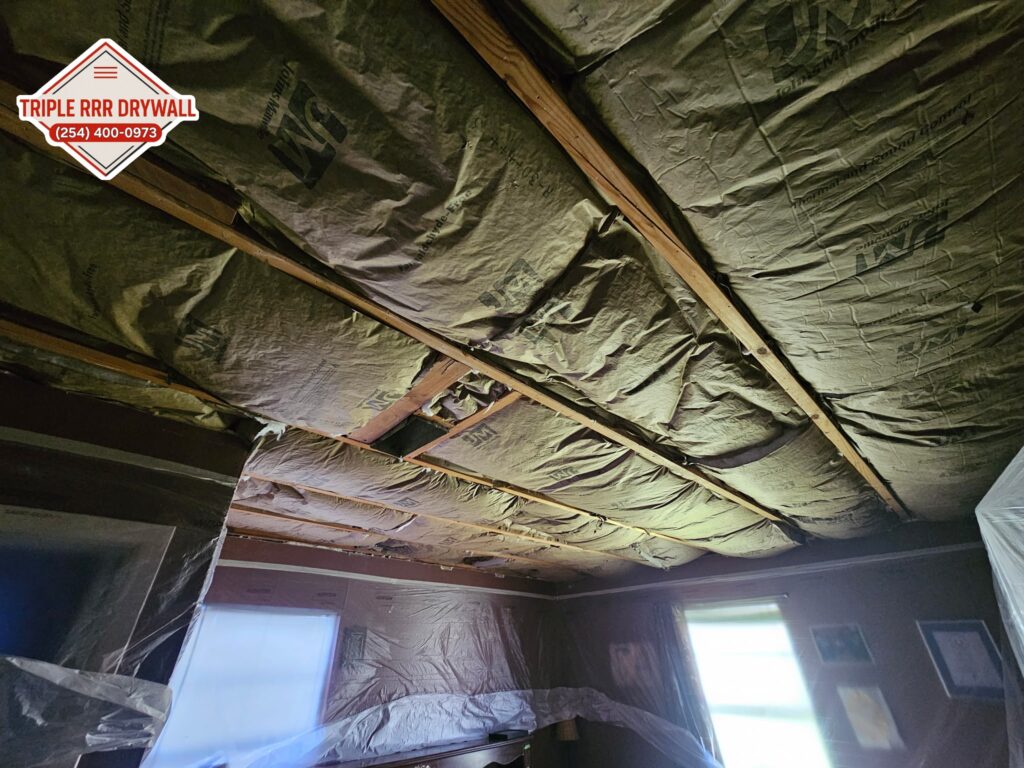 open ceiling with exposed insulation needing sheetrock installed waco tx