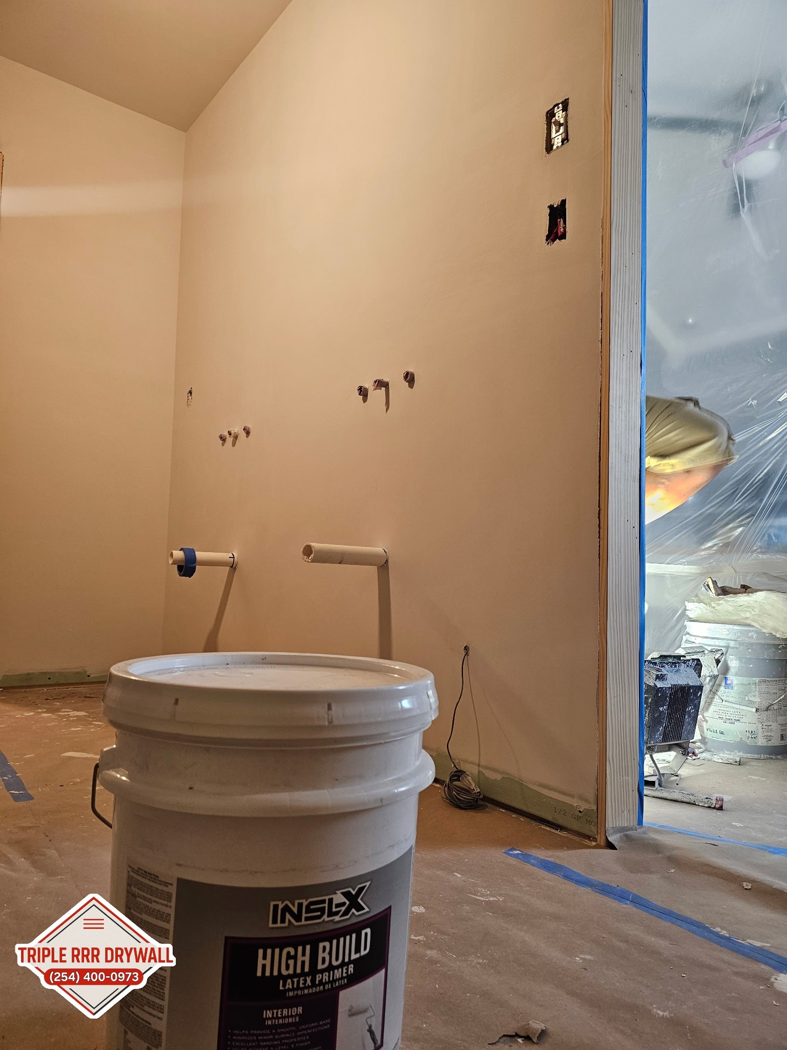 Smooth drywall finish prepared for paint by Triple RRR Drywall